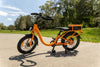 orange lighting electric bike