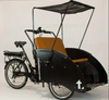 Black Tribe Bikes Ricky Rickshaw with yellow seat white the roof over the seat