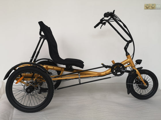 Side view of the gold coloured Trident semi-recumbent electric tricycle