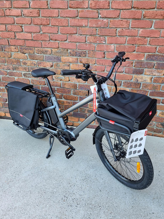 Benno Boost electric long-tail cargo bike with basket bag at front