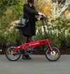 Lady riding the red BF i-Ezi Folding Electric Bike