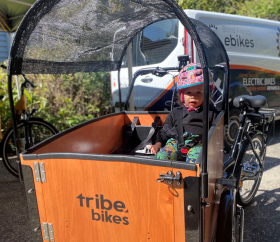 kid in tribe bike 