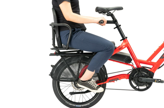 Person sitting on the back of a Information on the Tern GSD S10 LX Electric Cargo ebike