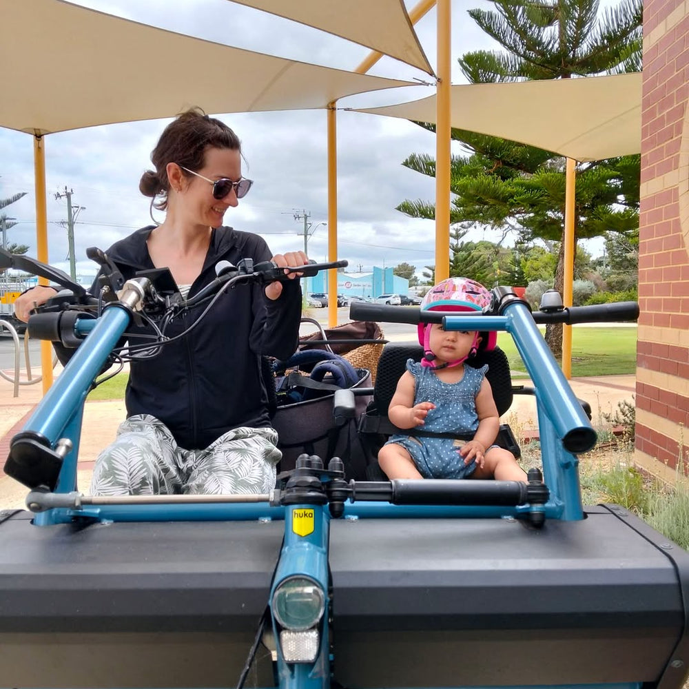 Mother and daughter on electric trike