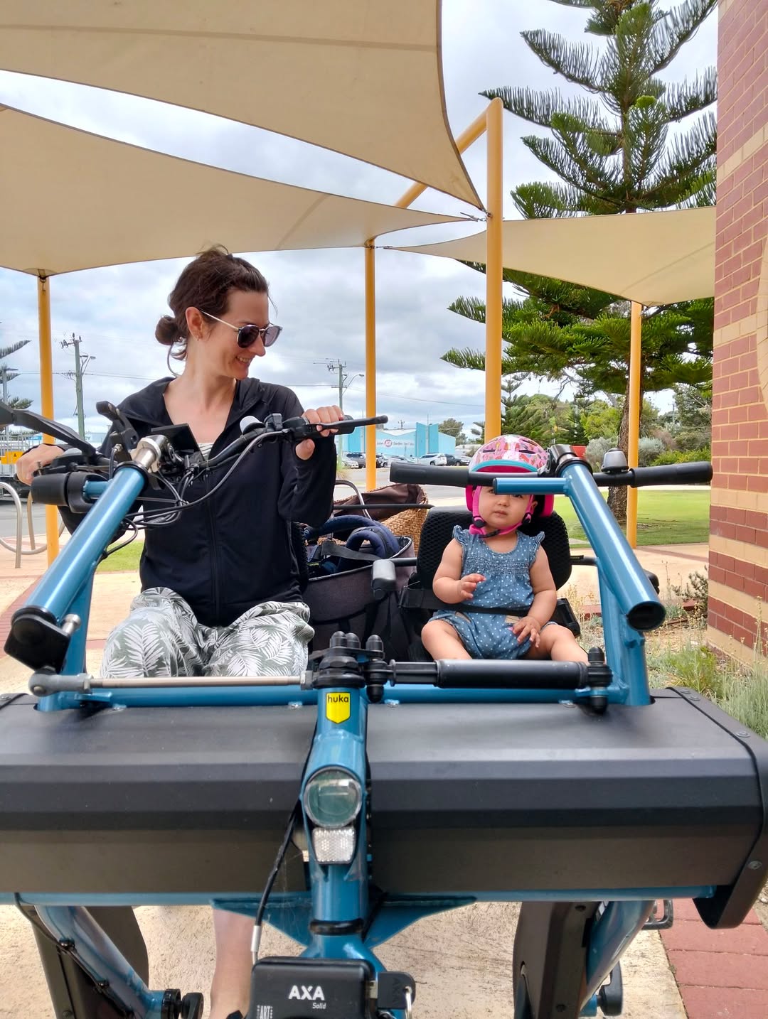 Mother and daughter on electric trike