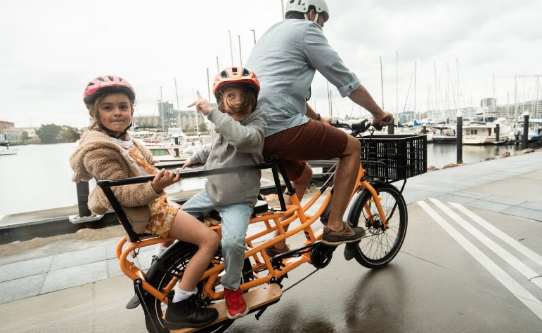 Family riding on a electric bike