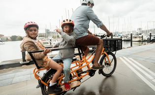  Family riding on a electric bike