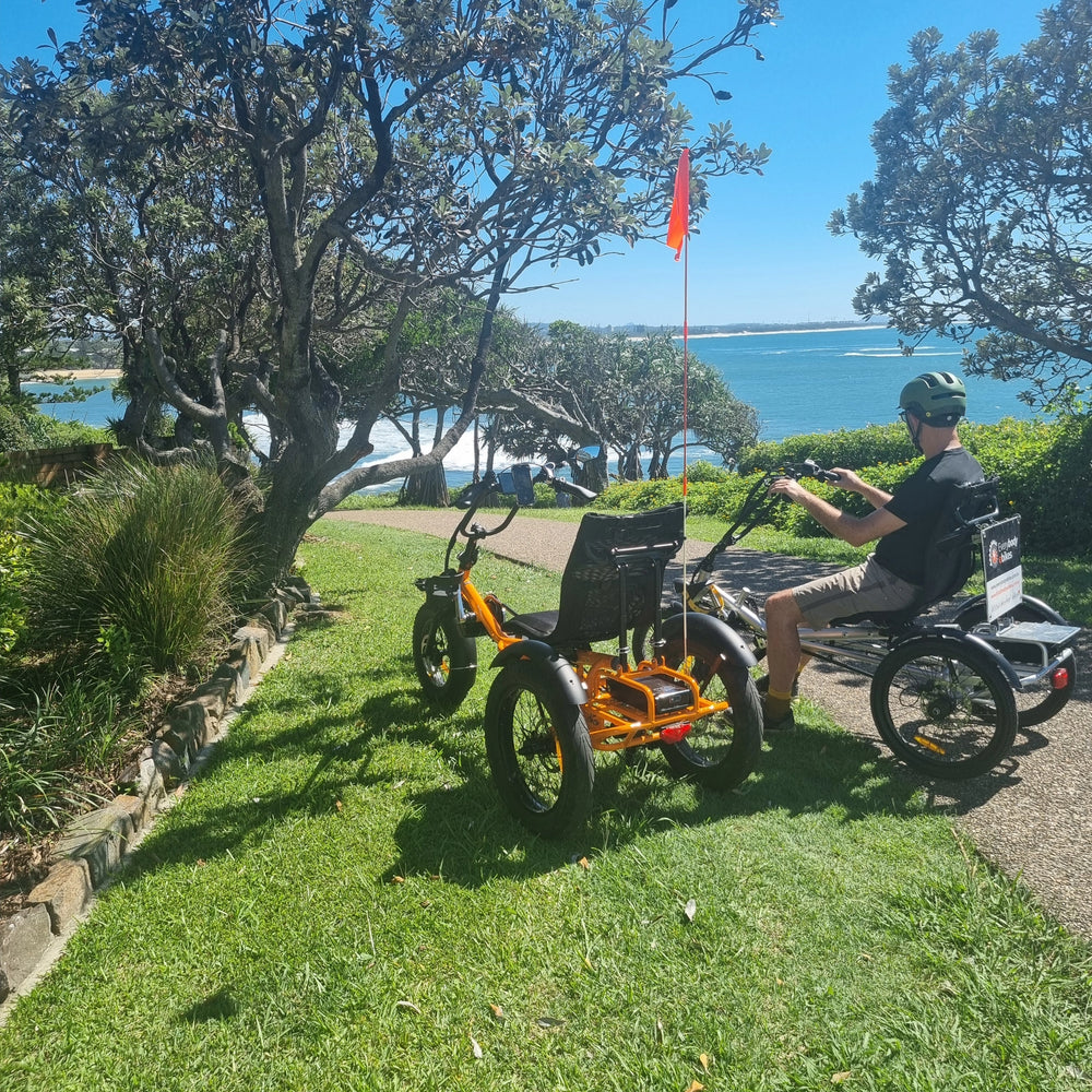 Older women Dawn riding a sit-down semi-recumbent tricycle