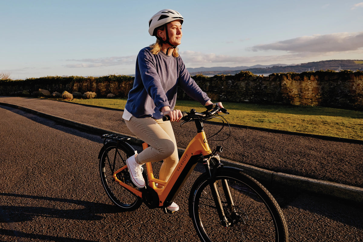 Lady riding electric bike
