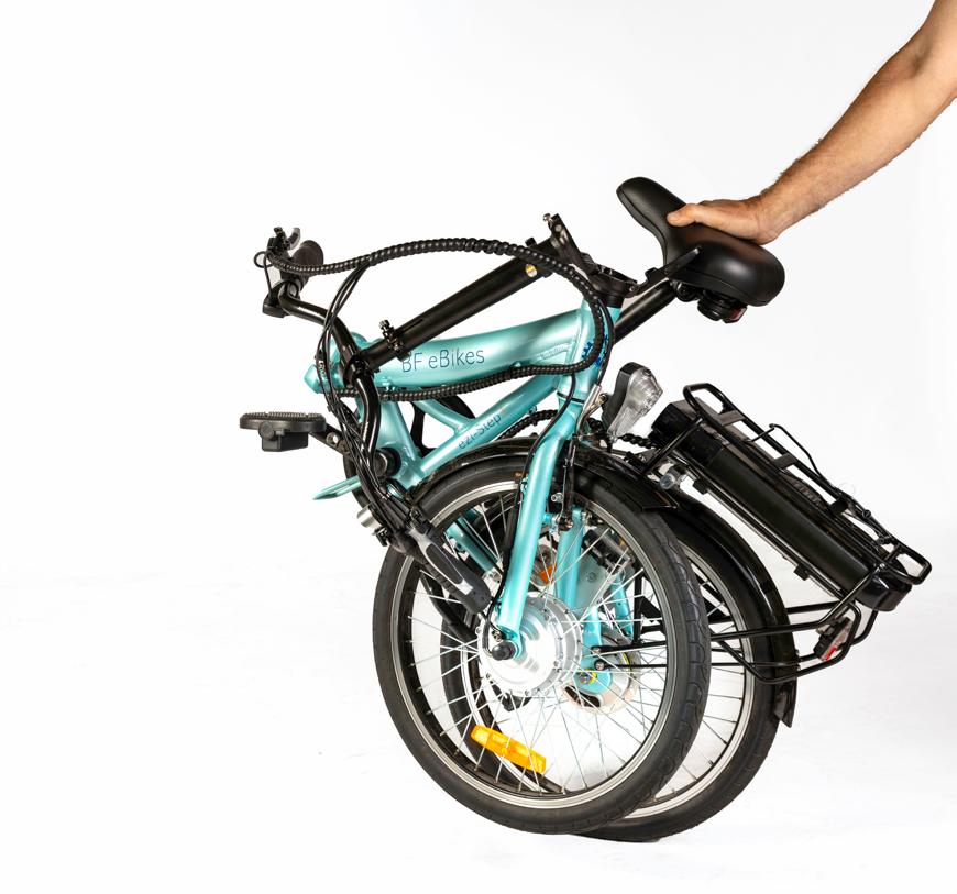 
                  
                    folded aqua coloured electric bike
                  
                