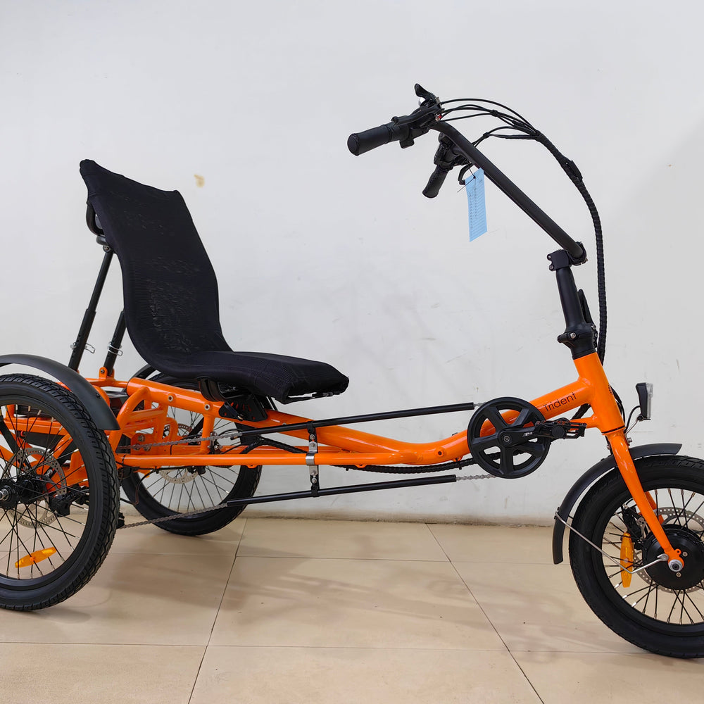 
                      
                        Side view of orange coloured Trident semi-recumbent electric tricycle
                      
                    