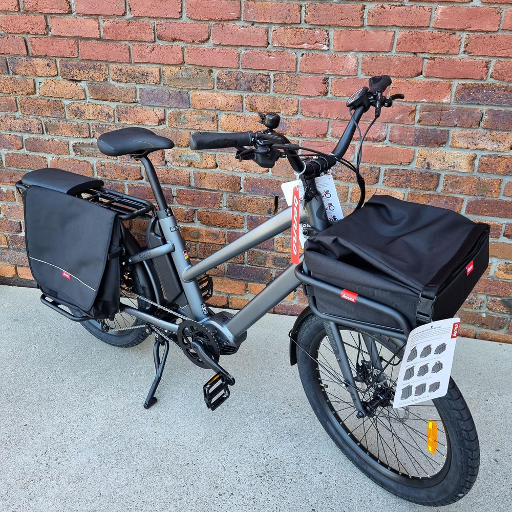 
                  
                    Benno Boost electric long-tail cargo bike with basket bag at front
                  
                