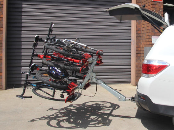 bikes stacked up on car bike rack