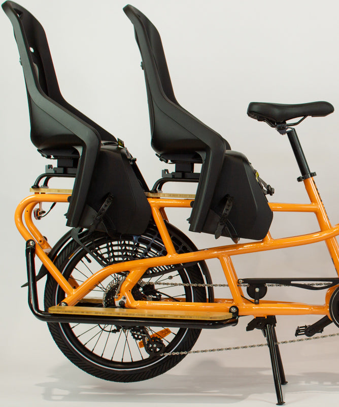 
                      
                        Dual seat on orange Tribe Bikes Evamos Longtail Cargo Bike
                      
                    