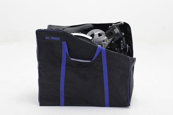 Di Blasi bag with folded tricycle in it
