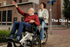 Elderly looking up while in front of a Huka Diaz Electric Wheelchair Tandem Trike