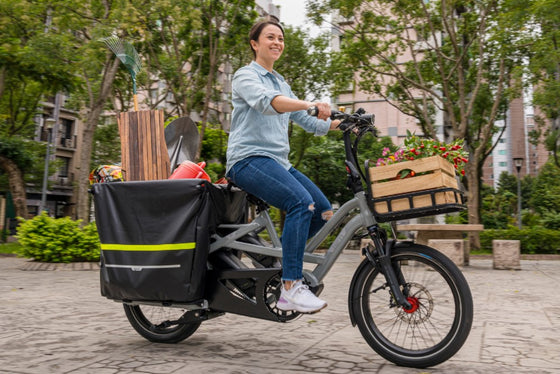 Lady shopping with her Tern GSD R14 Electric Cargo ebike